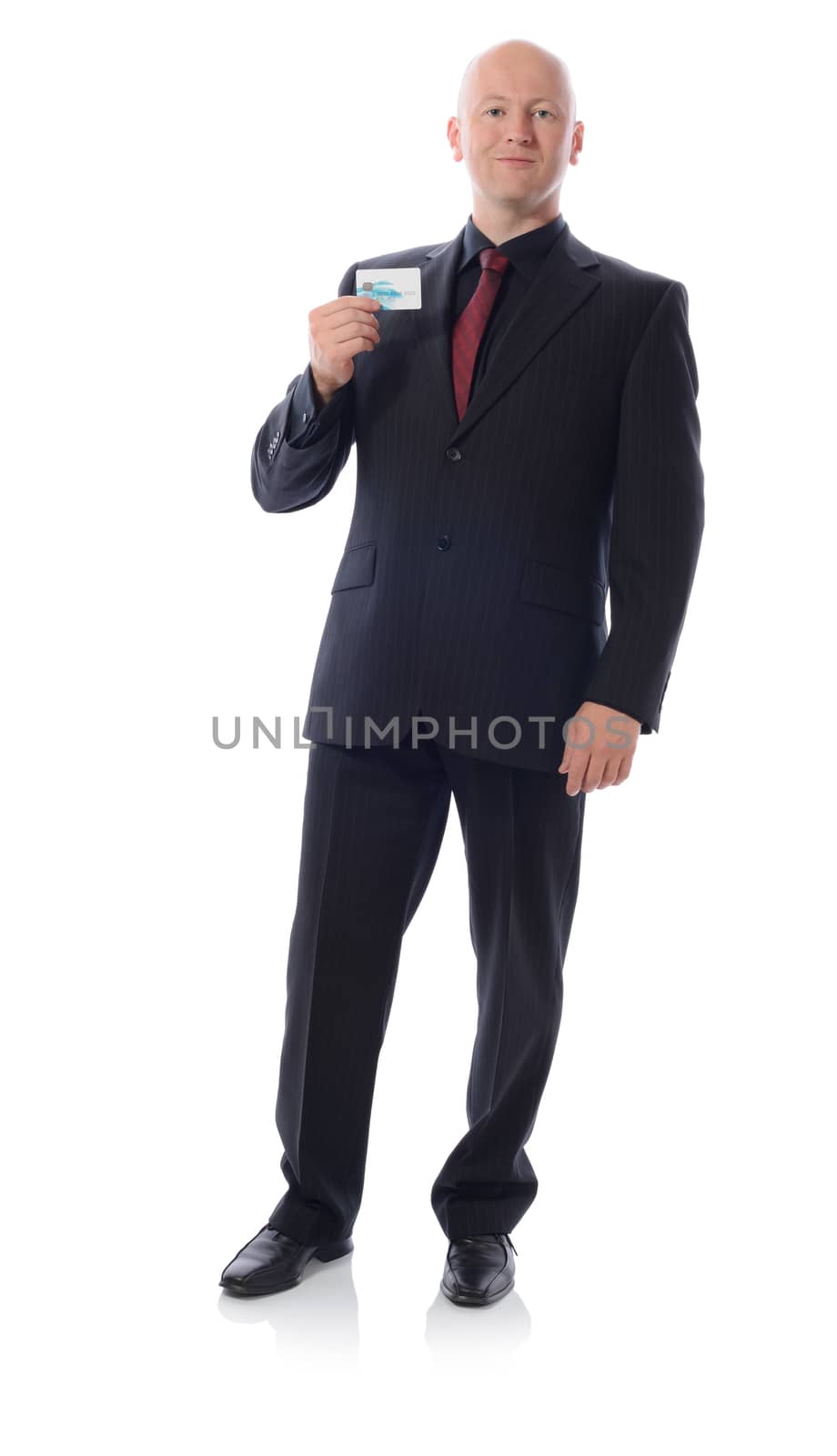 man in suit holding credit card isolated on white