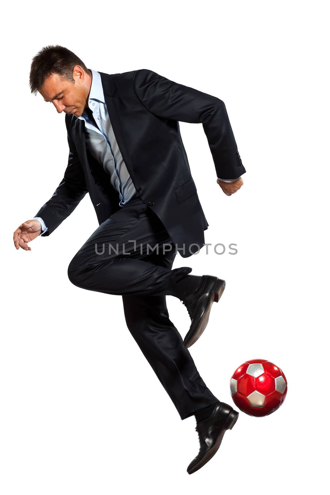 one business man playing juggling soccer ball by PIXSTILL