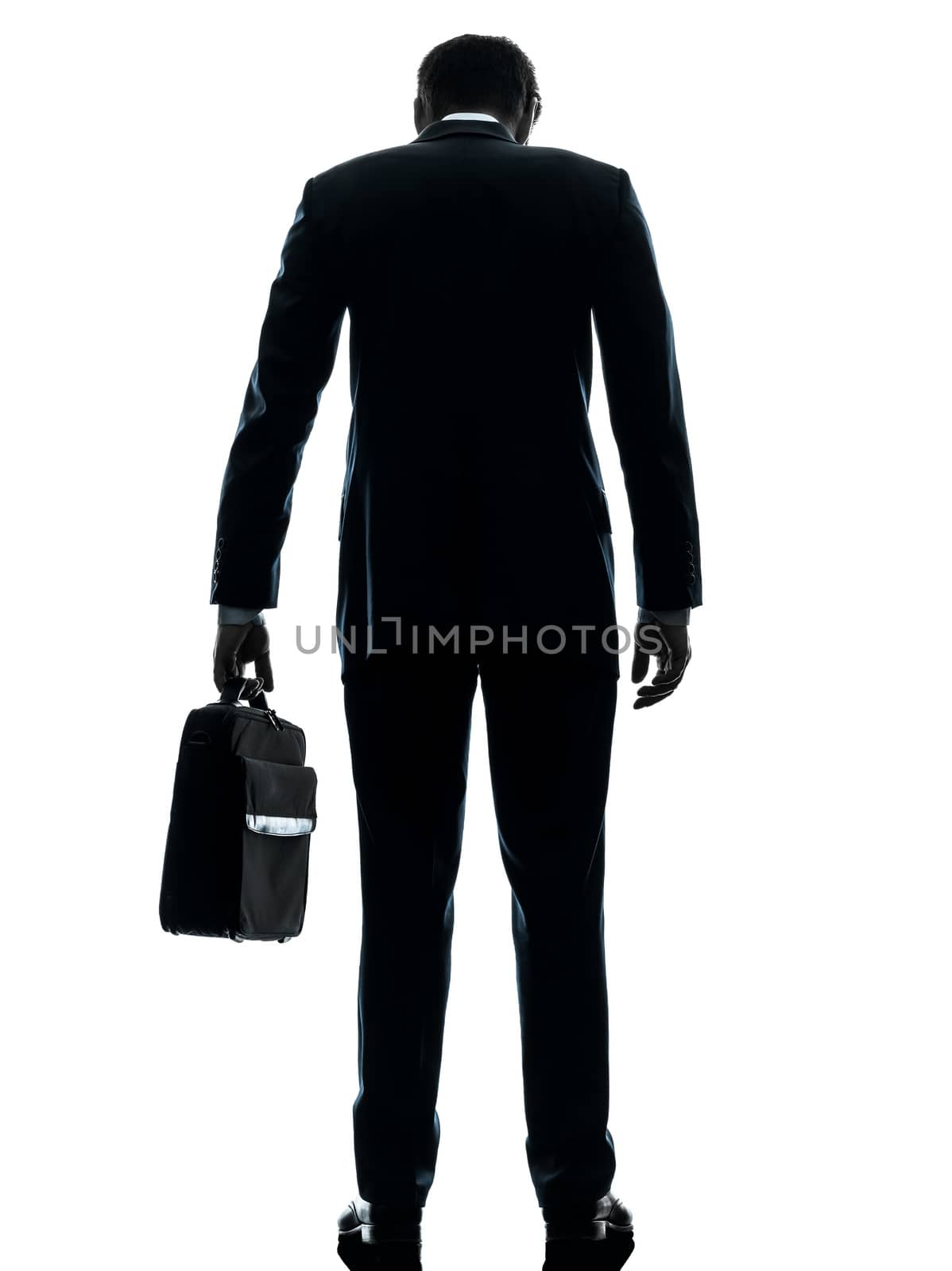 business man sad standing rear view silhouette by PIXSTILL