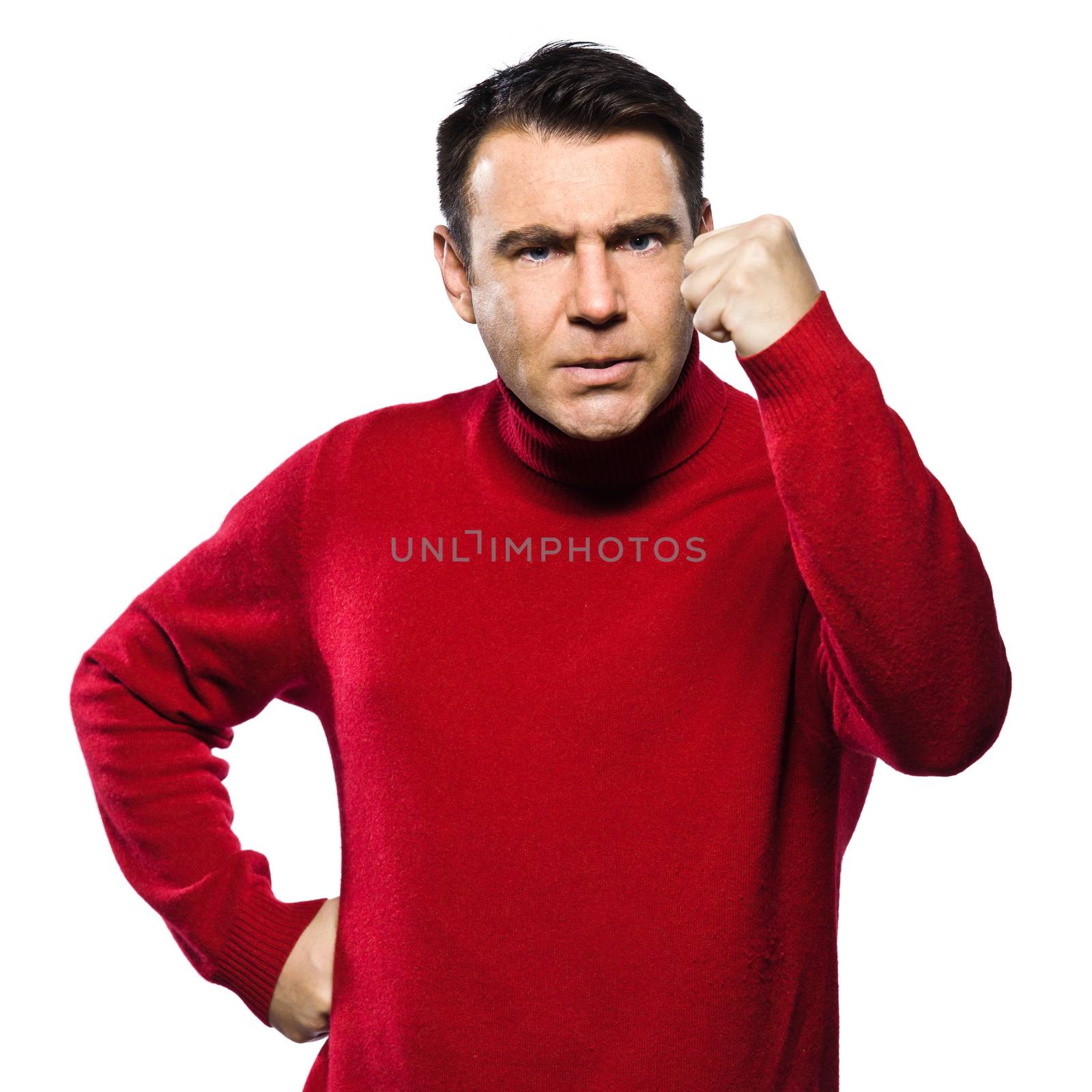 caucasian man angry gesturing fist raised menacing threat studio portrait on isolated white backgound