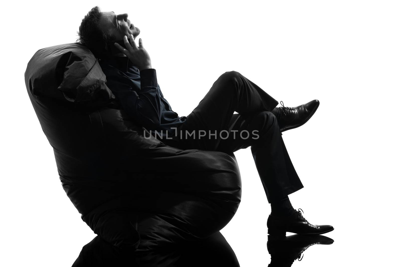 man sitting on the telephone silhouette by PIXSTILL