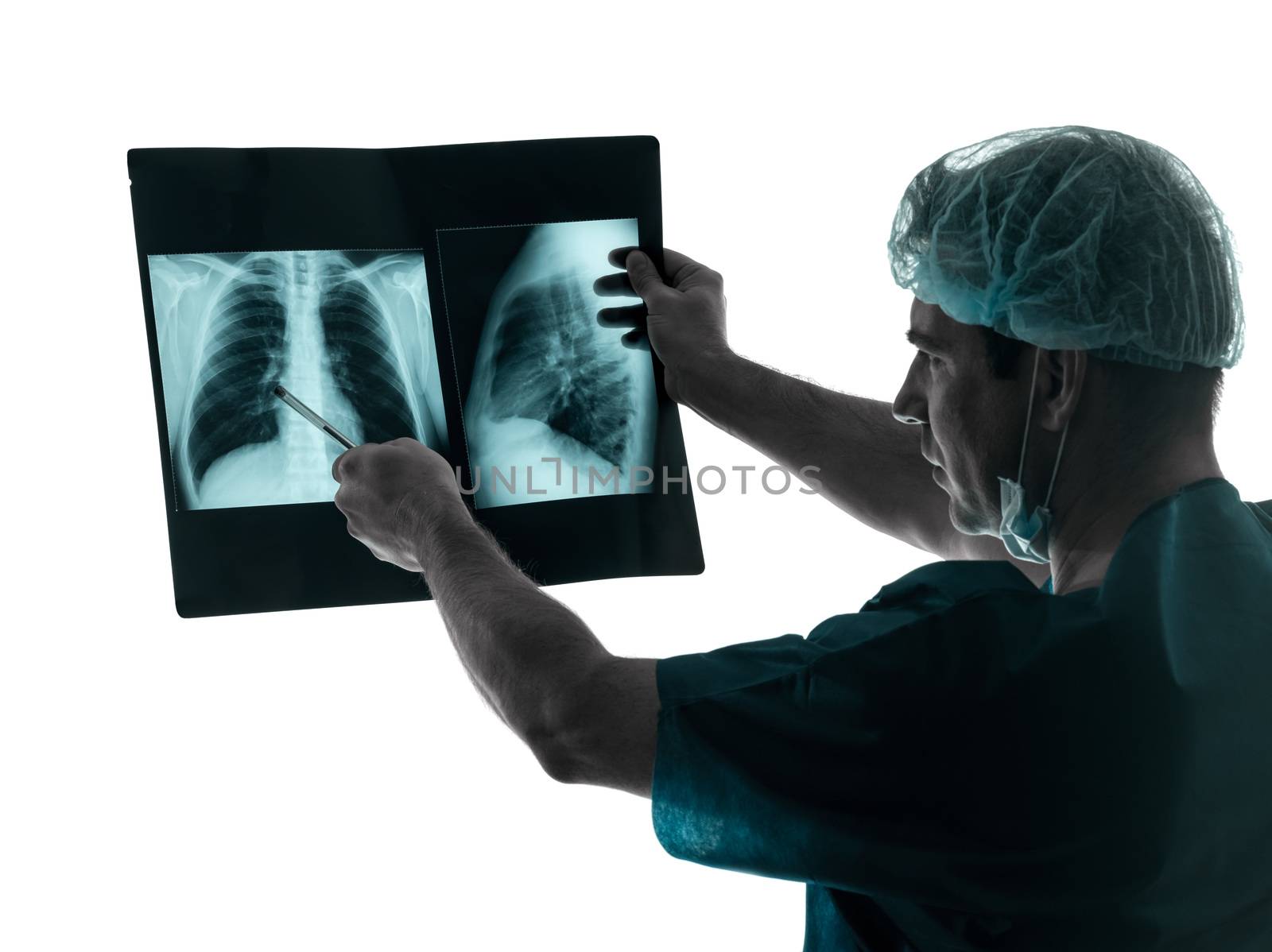 one caucasian man doctor surgeon radiologist medical examining lung torso  x-ray image silhouette isolated on white background