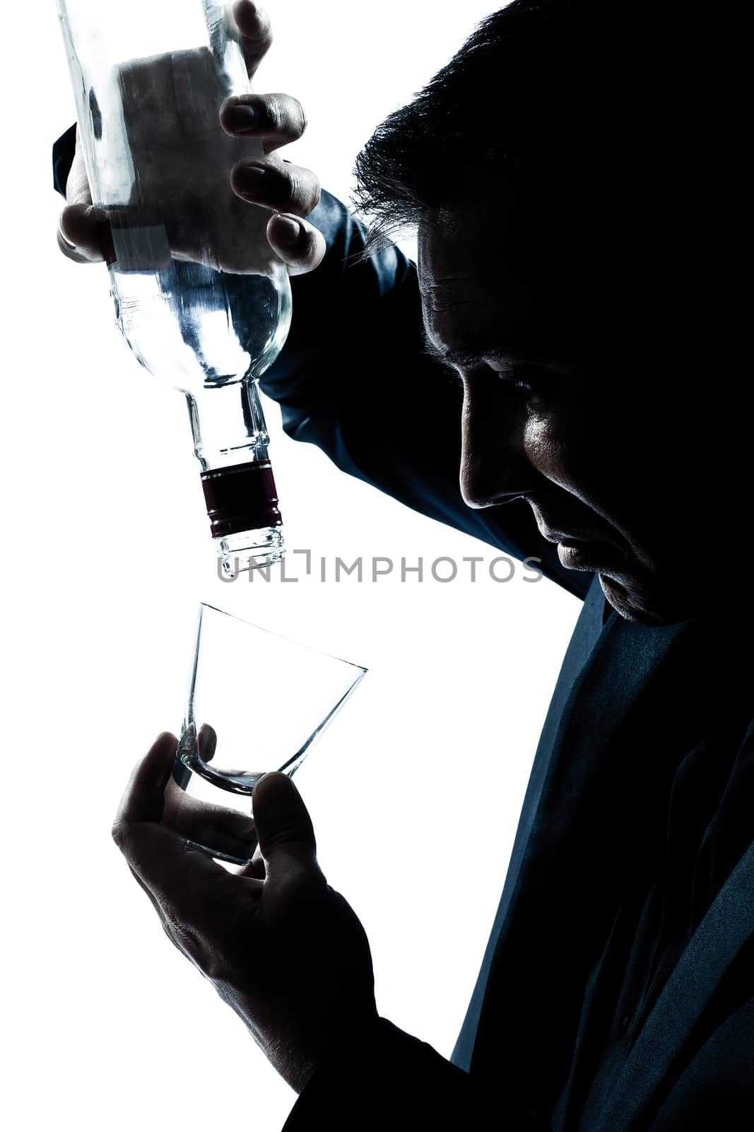 silhouette man drunk pouring empty alcohol botlle by PIXSTILL