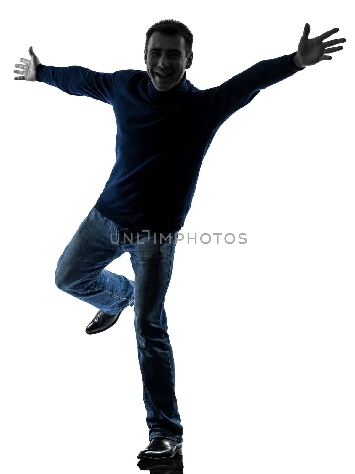 one caucasian man happy saluting  full length in silhouette studio isolated on white background