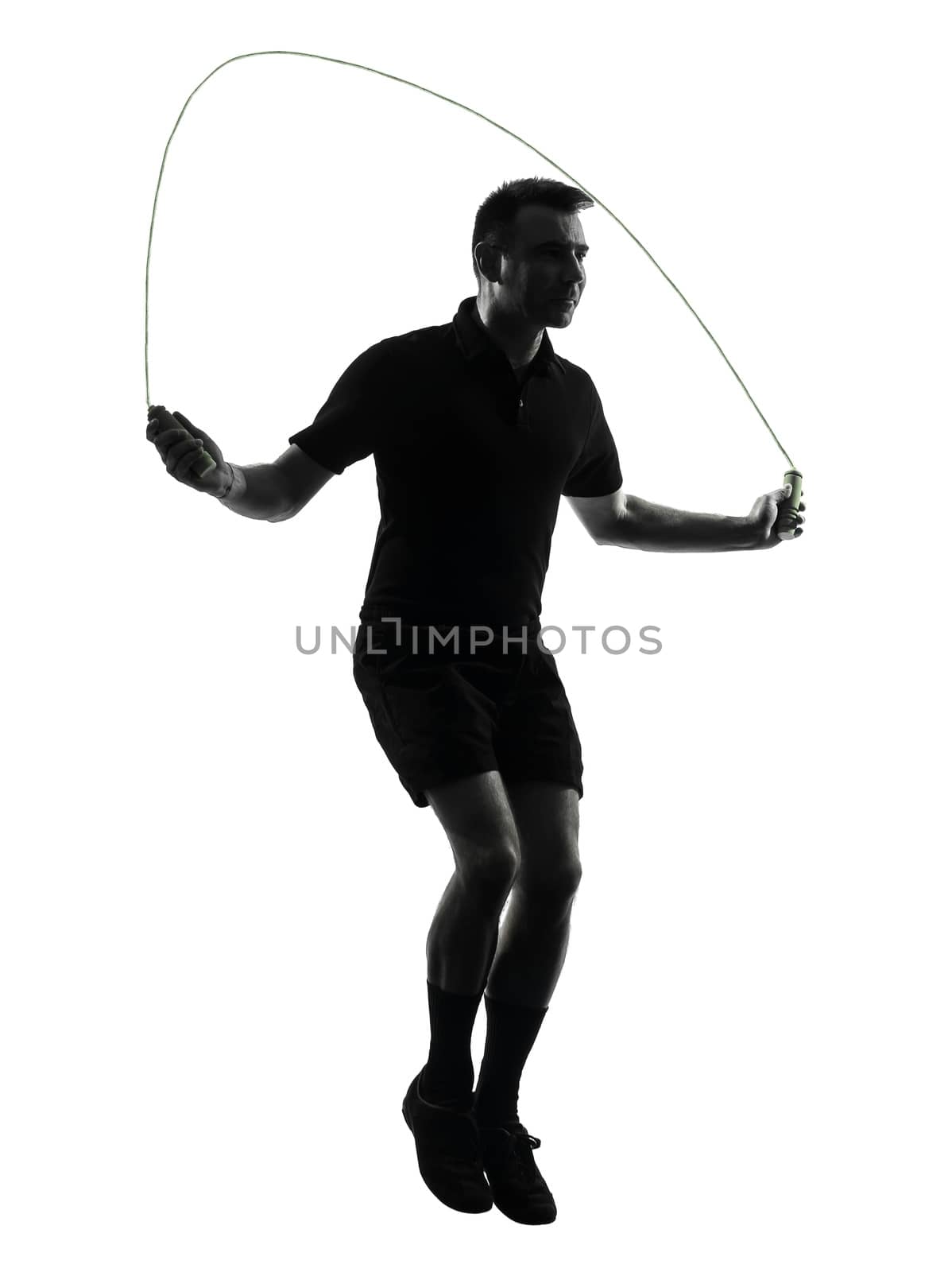 man exercising jumping rope silhouette by PIXSTILL