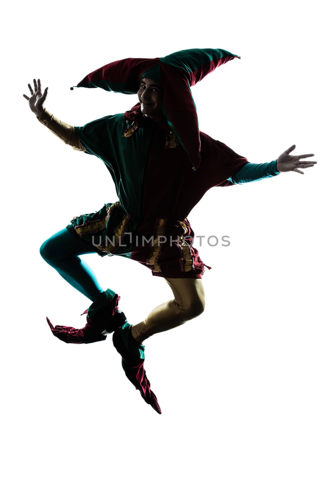man in jester costume silhouette jumping by PIXSTILL