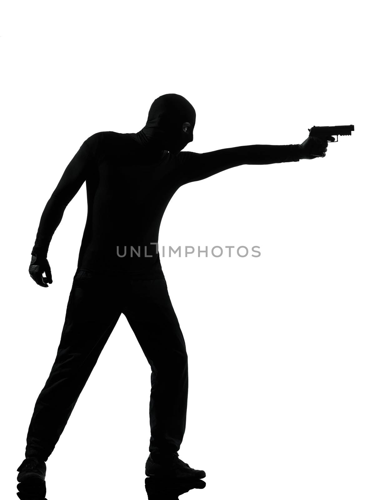 thief criminal terrorist aiming gun man by PIXSTILL