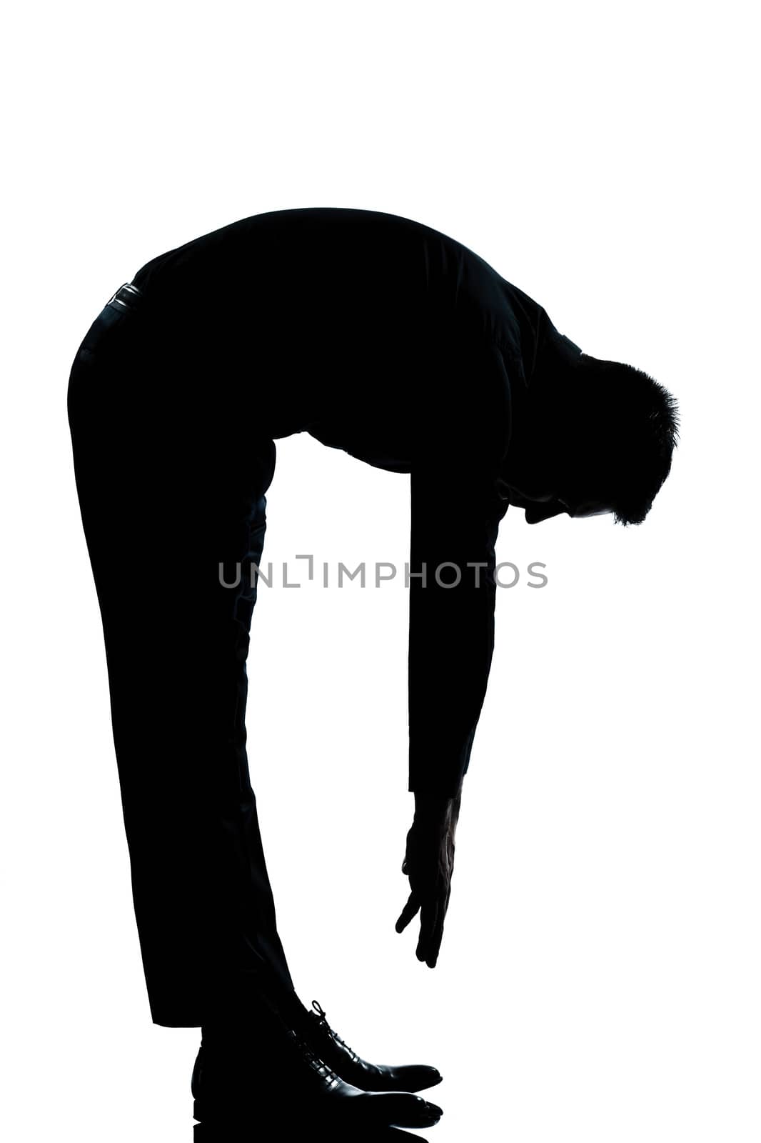 silhouette man stretching back full length by PIXSTILL