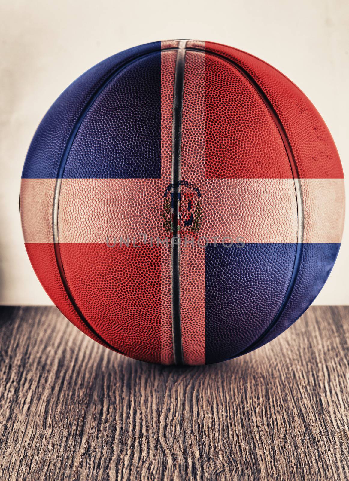 Close up of an old leather basketball with Dominican Republic flag