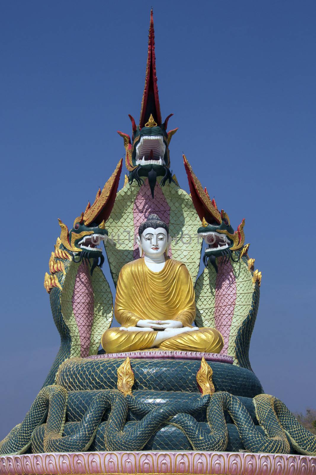 A Buddha Image protected by Nagas (mythical dragon-like creatures) near Monywa in Myanmar (Burma).