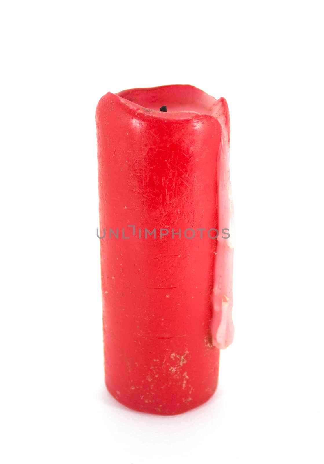 Red wax candle isolated