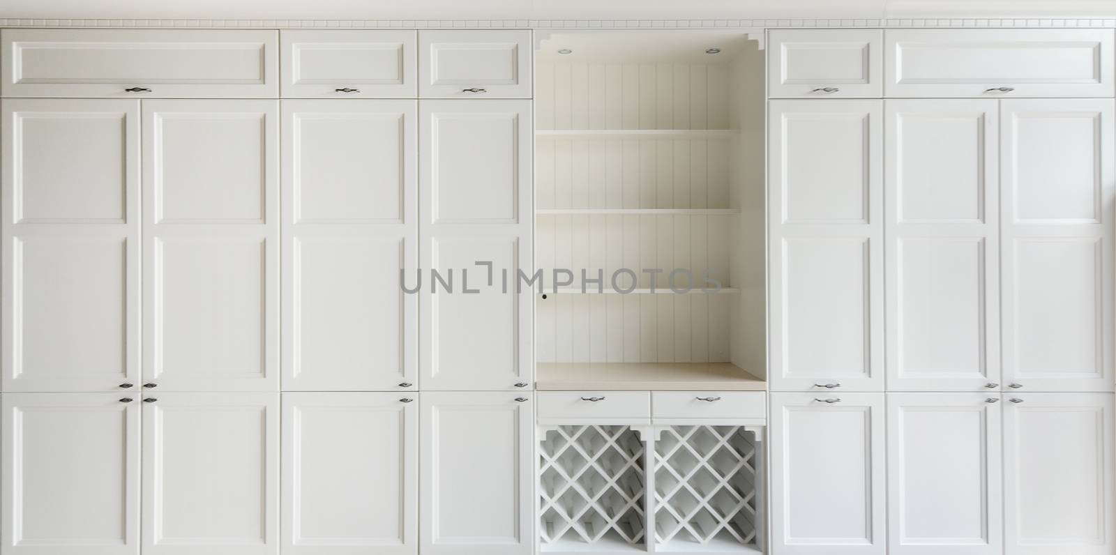White vintage cupboard with shelf