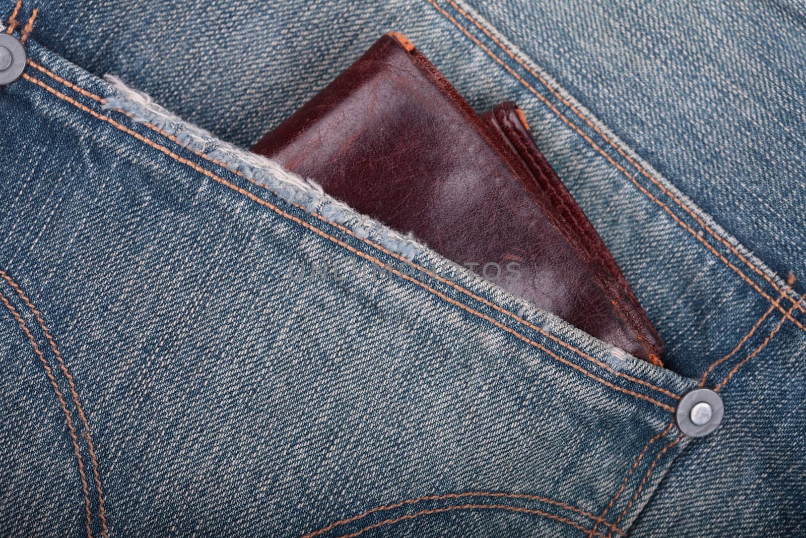 wallet on a pocket of jeans