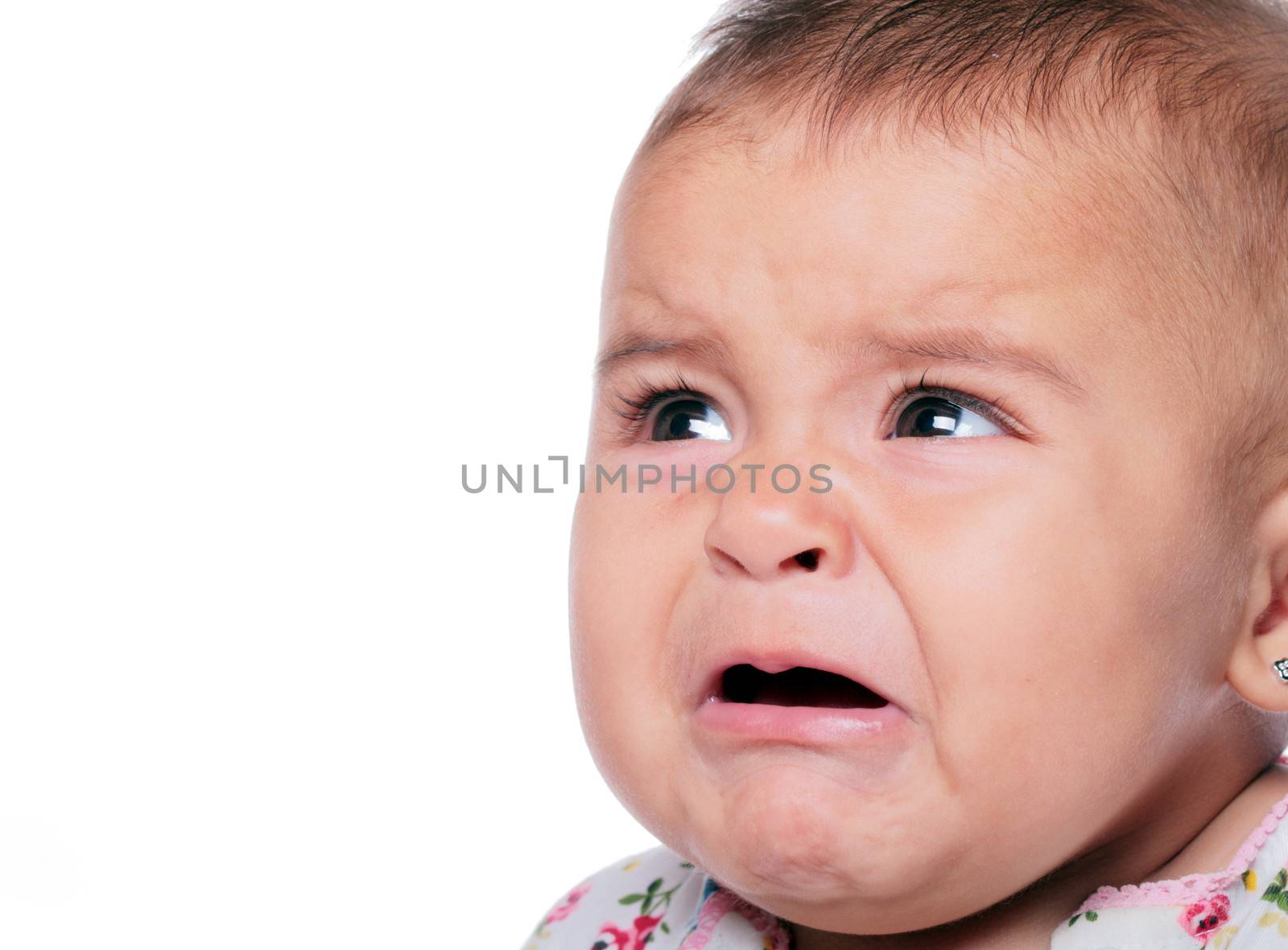 portrait of a baby crying isolated on white
