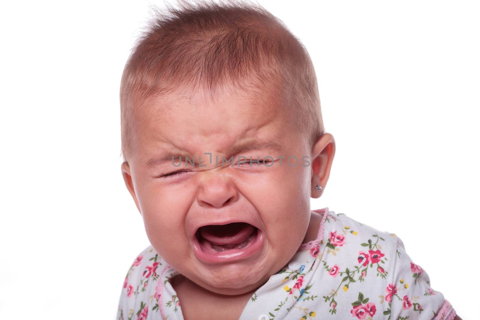 portrait of a baby crying isolated on white