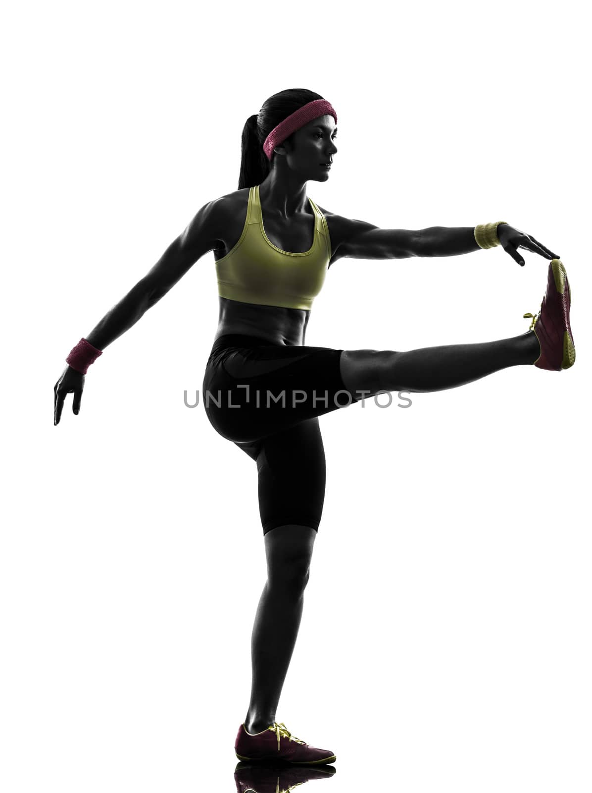one  woman exercising fitness workout stretching in silhouette  on white background