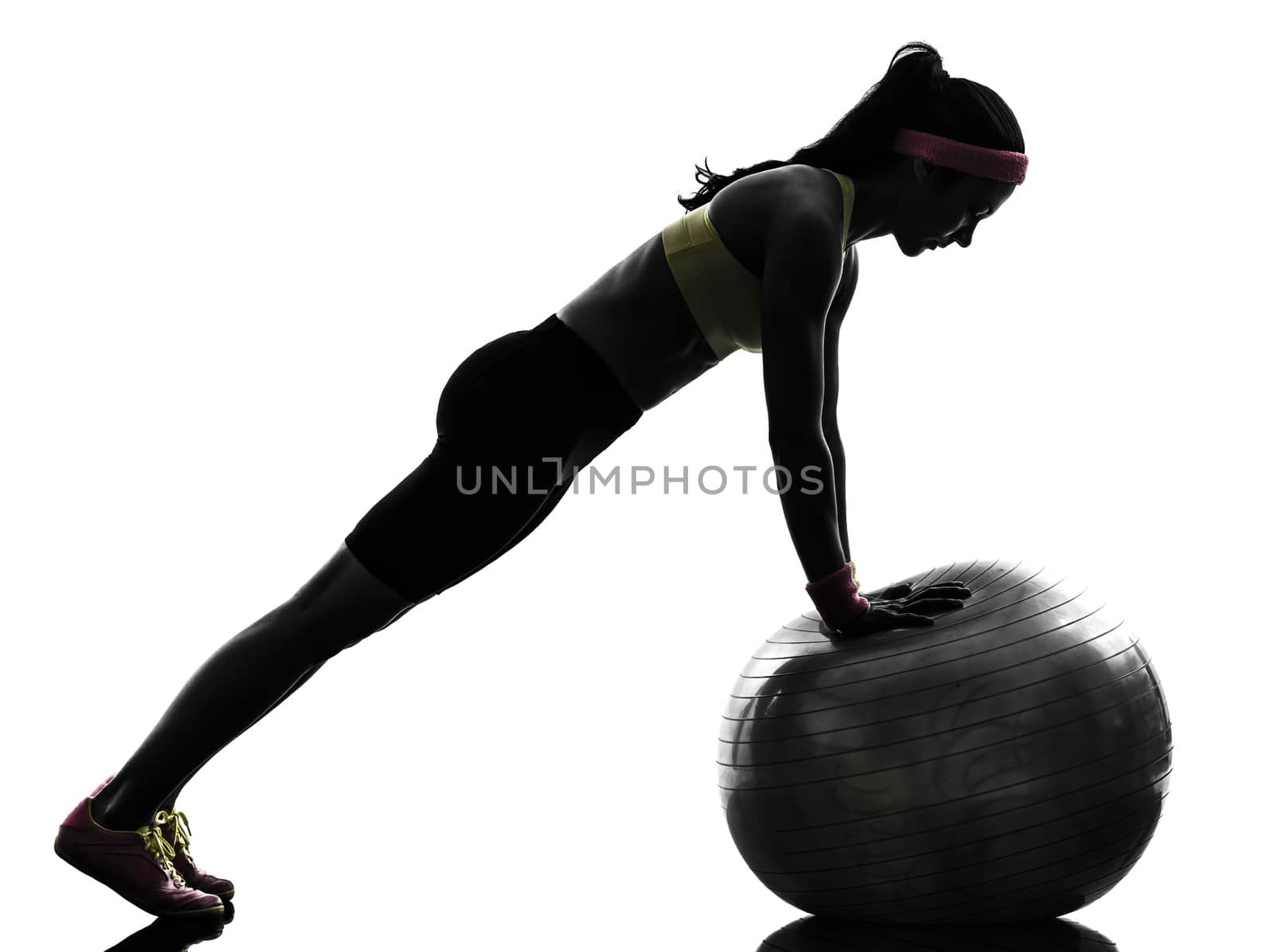 woman exercising fitness workout push ups  silhouette by PIXSTILL