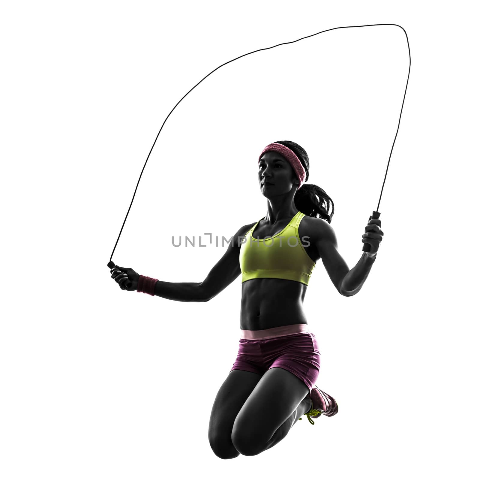woman exercising fitness jumping rope  silhouette by PIXSTILL