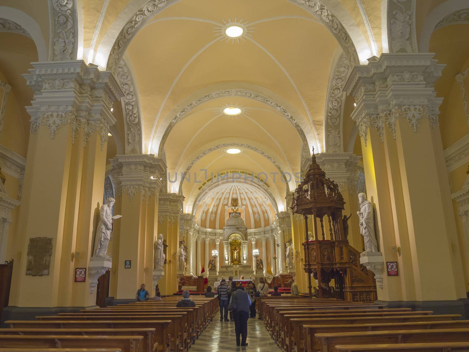 AREQUIPA, PERU - MAR 11: Interior of Cathedral de Arequipa on March 11, 2011 in Arequipa, Peru. The church is ornate facade and main altar covered with gold.