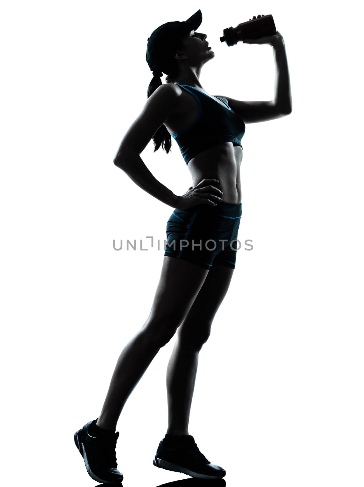 woman runner jogger drinking by PIXSTILL