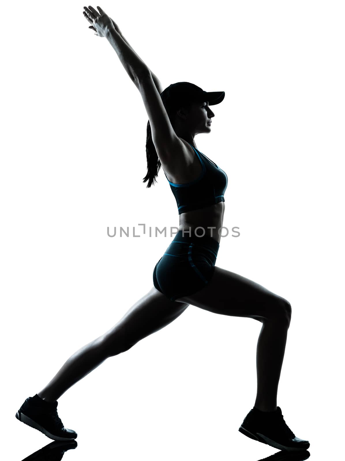 one caucasian woman runner jogger  stretching warm up in silhouette studio isolated on white background