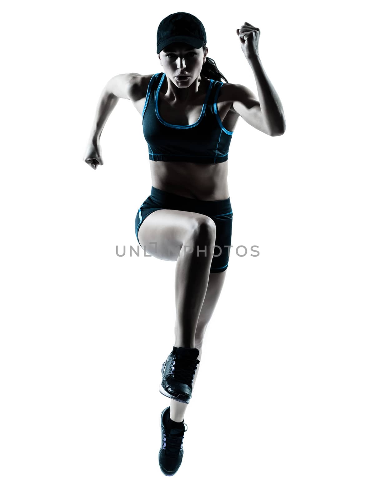 one caucasian woman runner jogger jumping in silhouette studio isolated on white background