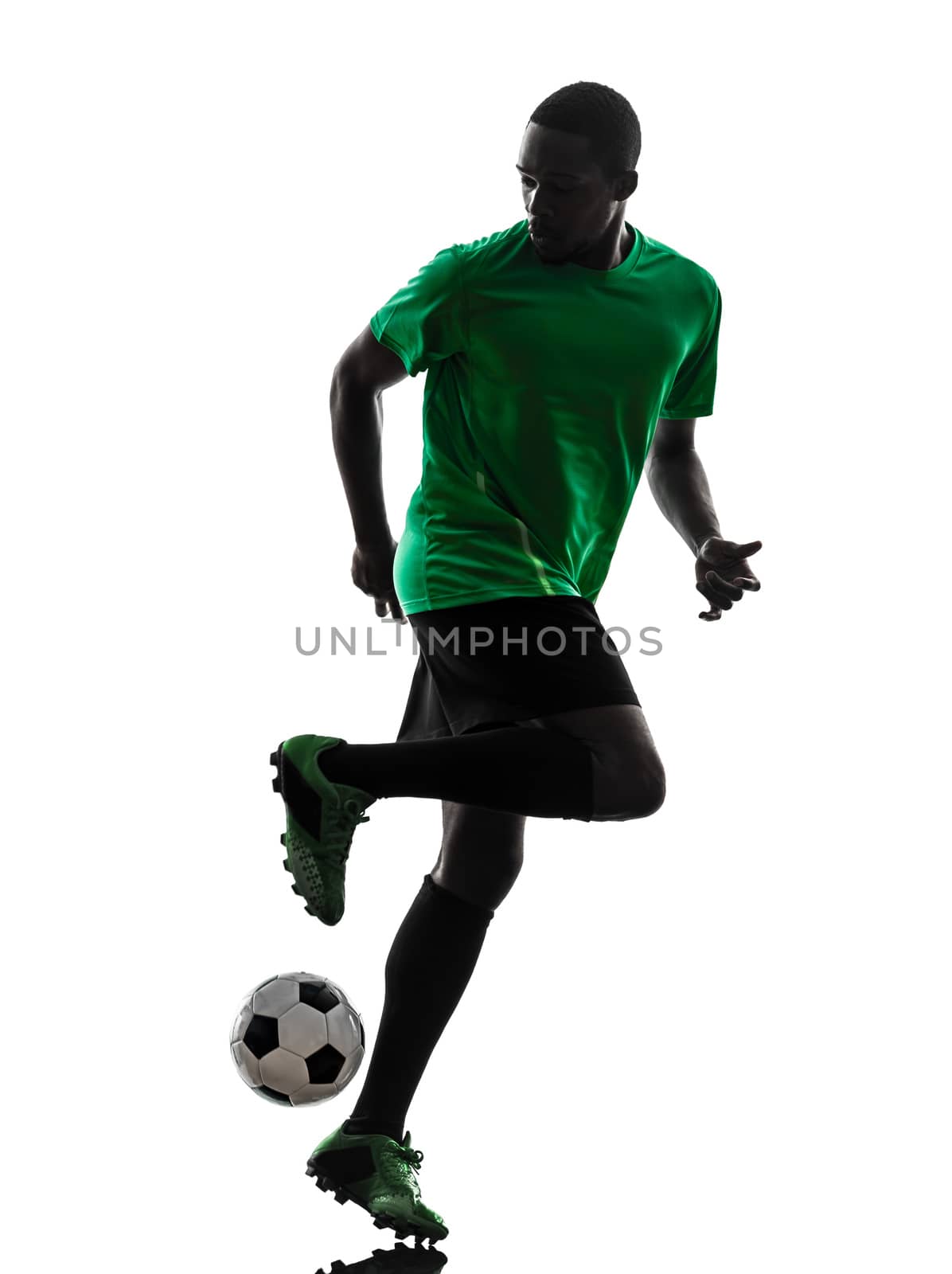 one african man soccer player green jersey in silhouette  on white background