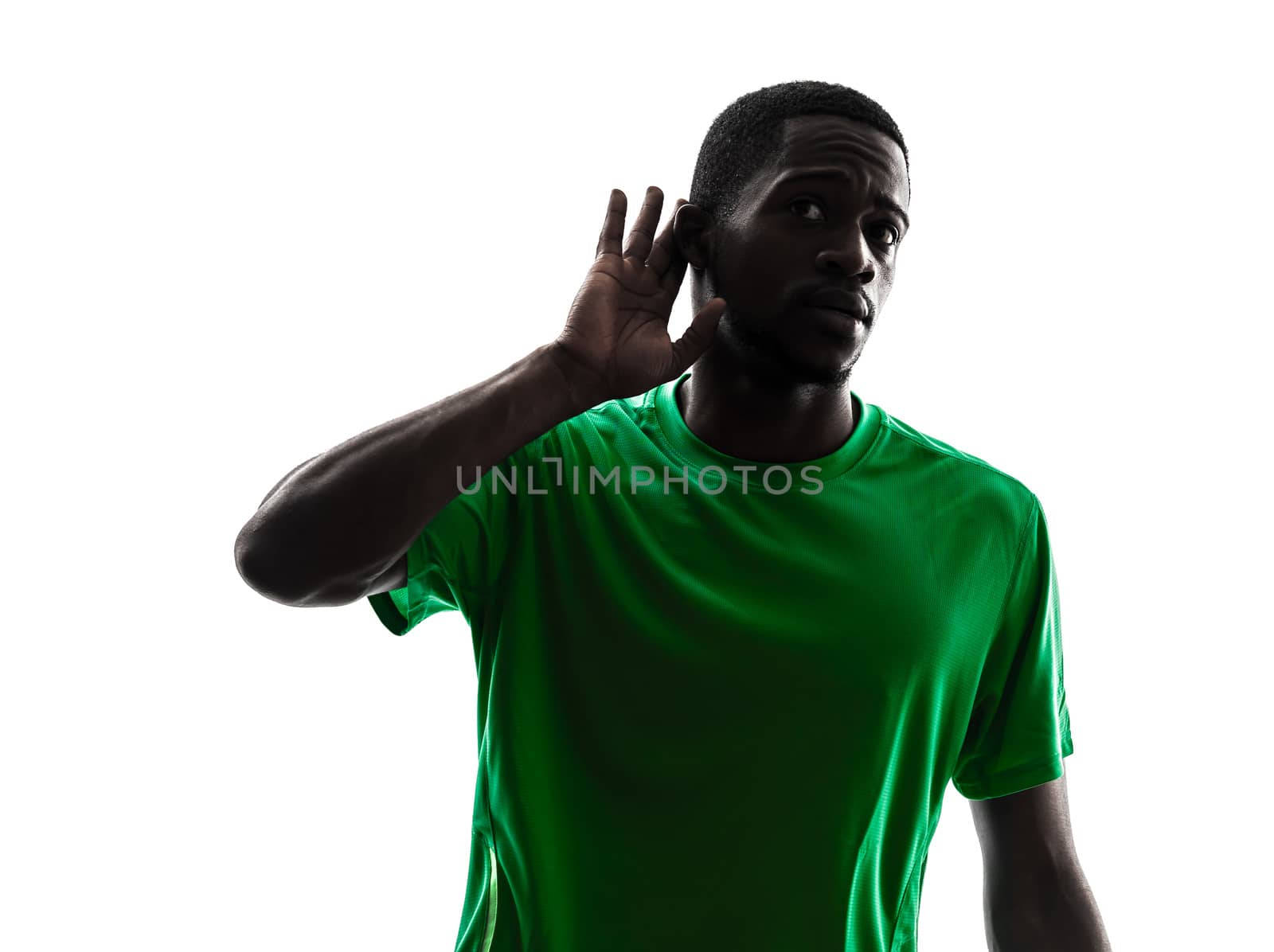 african man soccer player  silhouette hearing gesture  by PIXSTILL