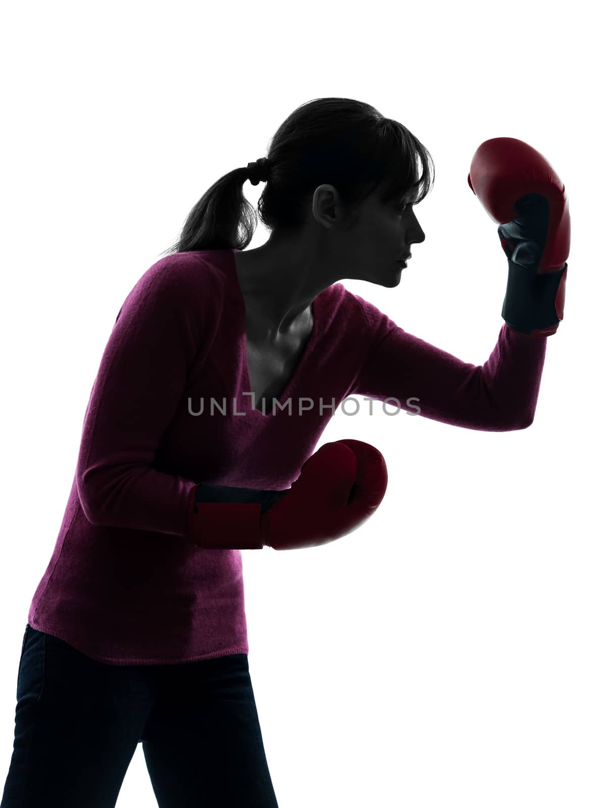 mature woman with boxing gloves silhouette by PIXSTILL