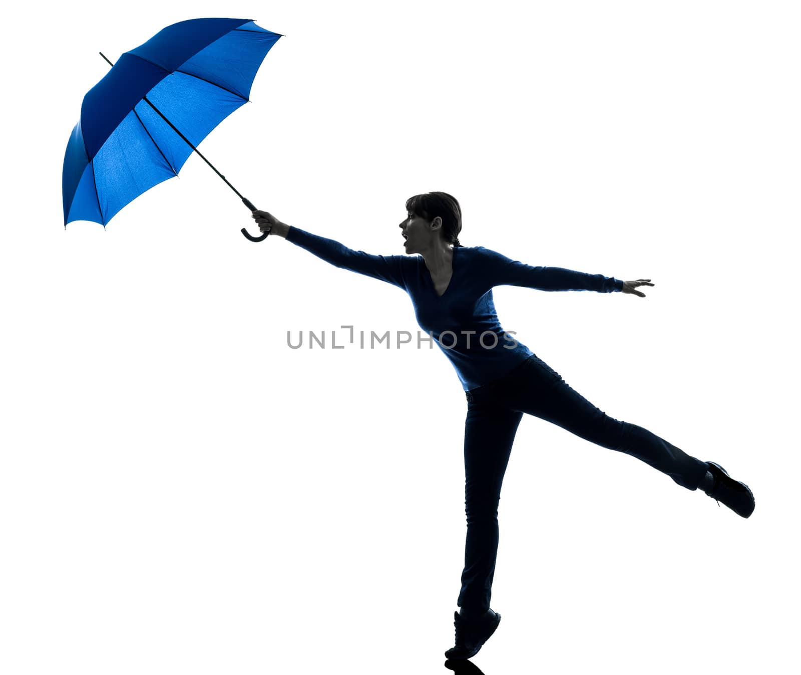 woman holding umbrella wind blowing silhouette by PIXSTILL