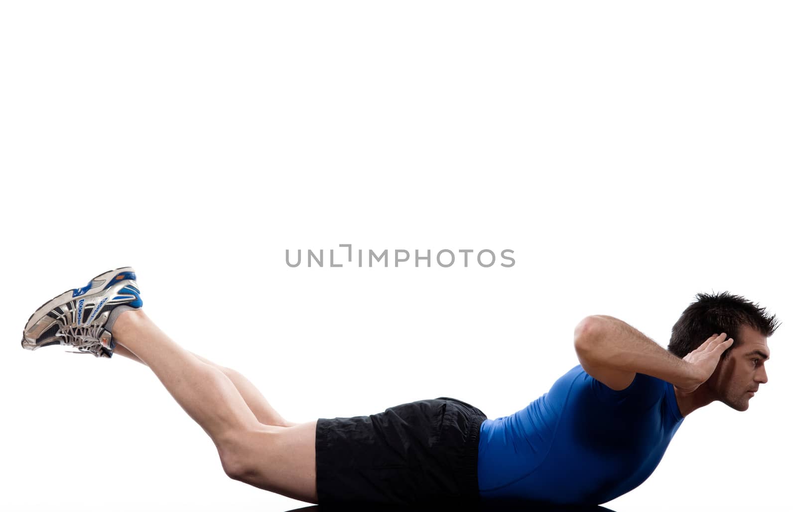man exercising abdominals workout on studio isolated white background