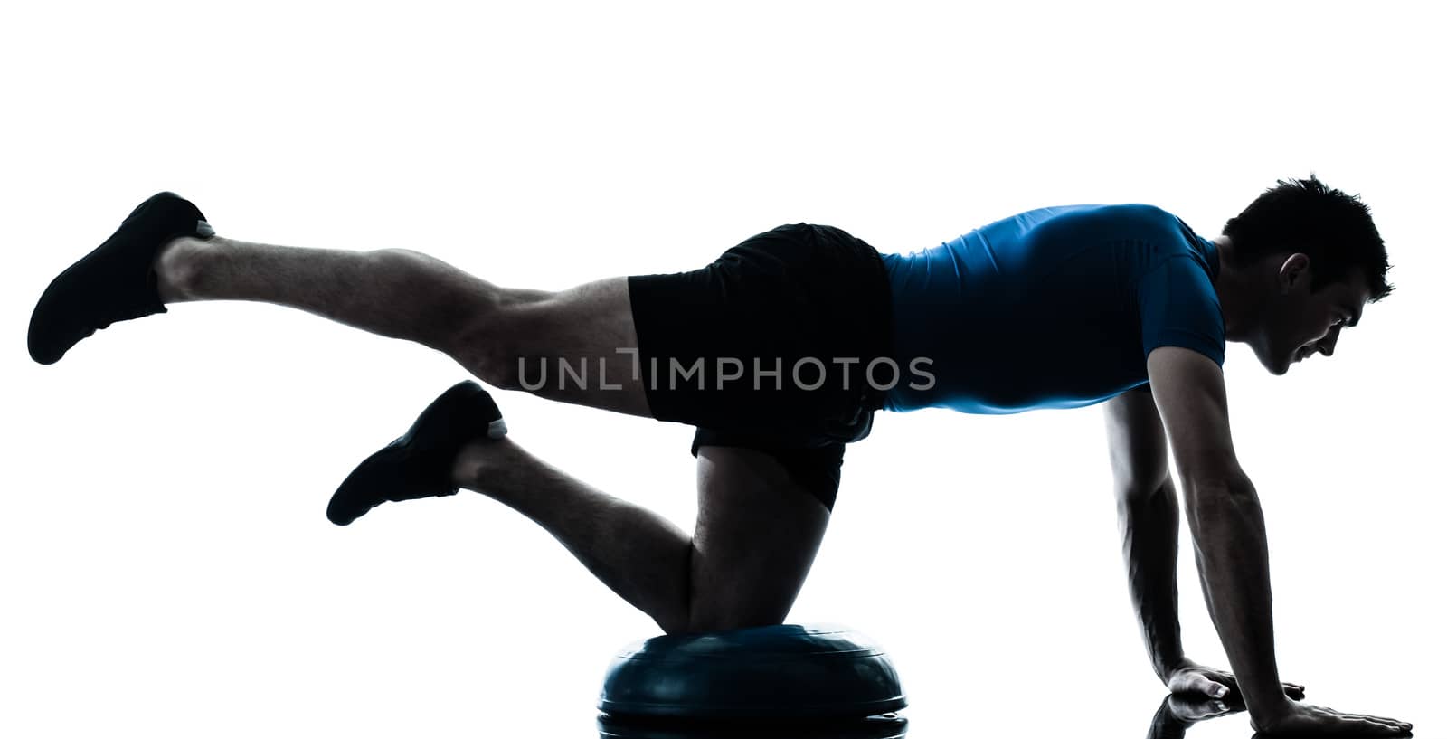 one caucasian man exercising bosu workout fitness in silhouette studio  isolated on white background