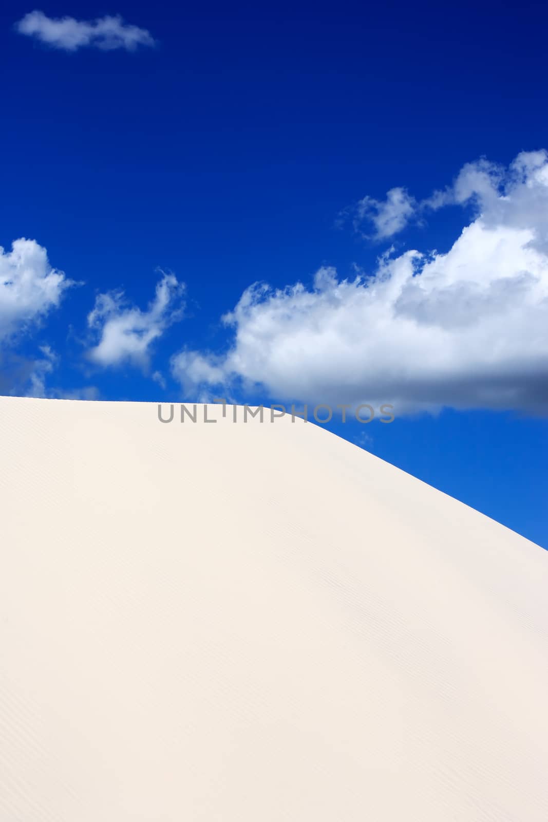 view of lagoa azul in desert sand dunes of the Lencois Maranheses National Park in brazil