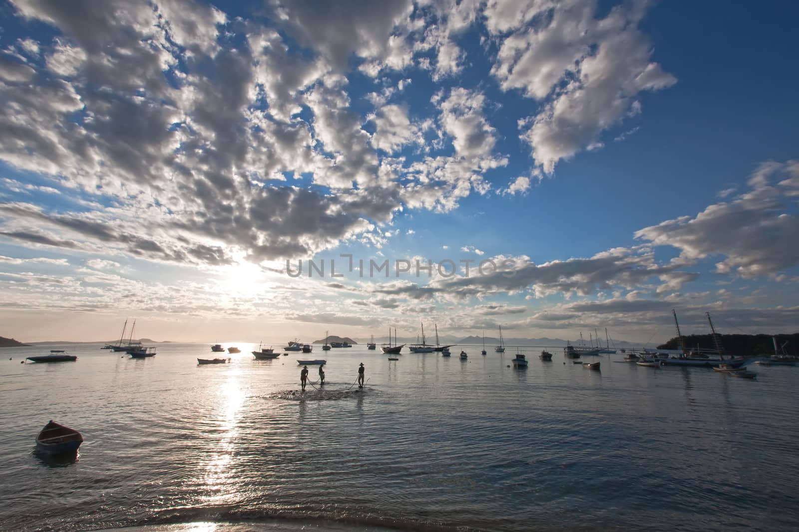 sunset over praia da armacao in the beautiful typical brazilian city of buzios near rio de janeiro in brazil