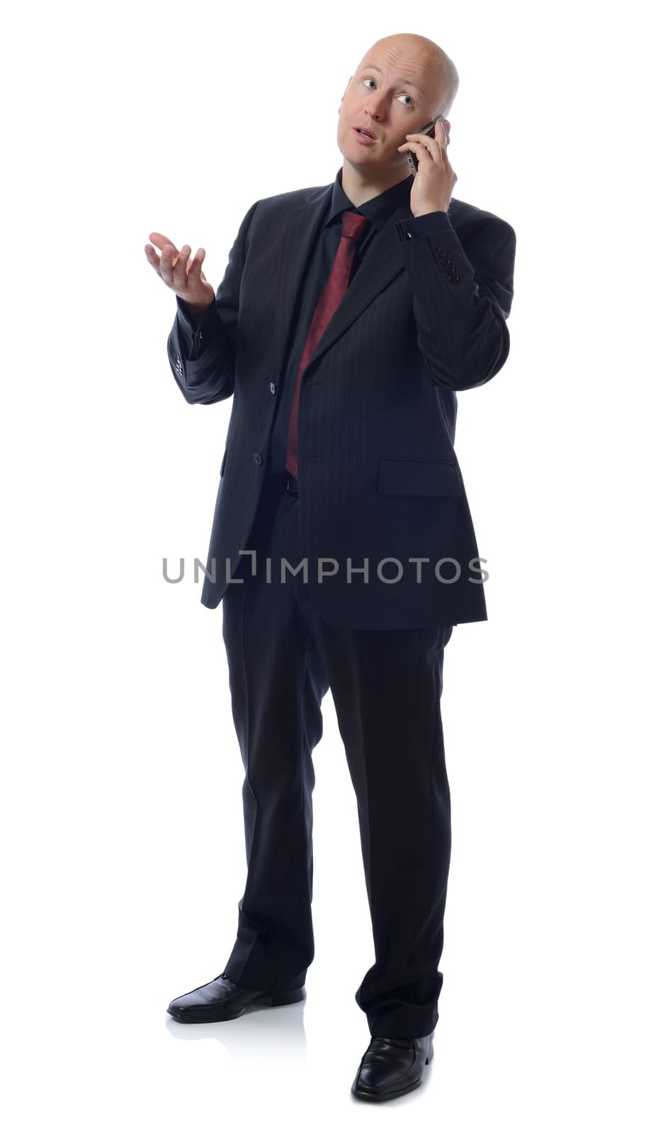 Buisness man on mobile phone isolated on white