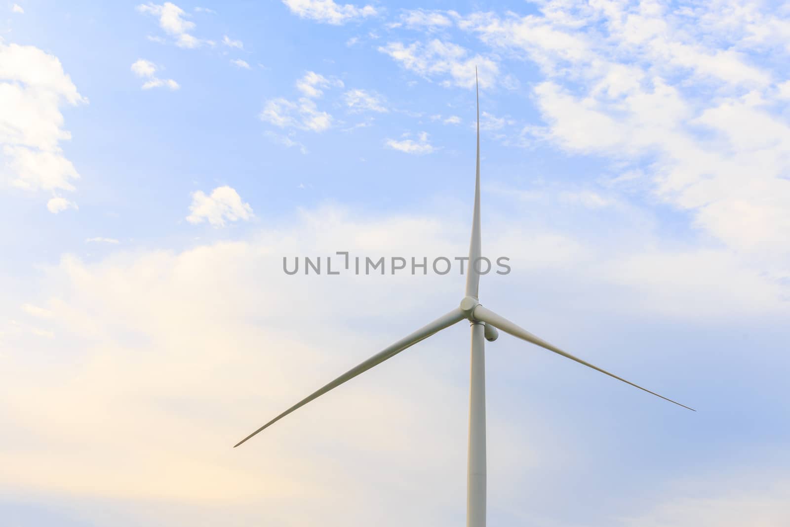Stand alone Wind Turbine Generator before sunset.