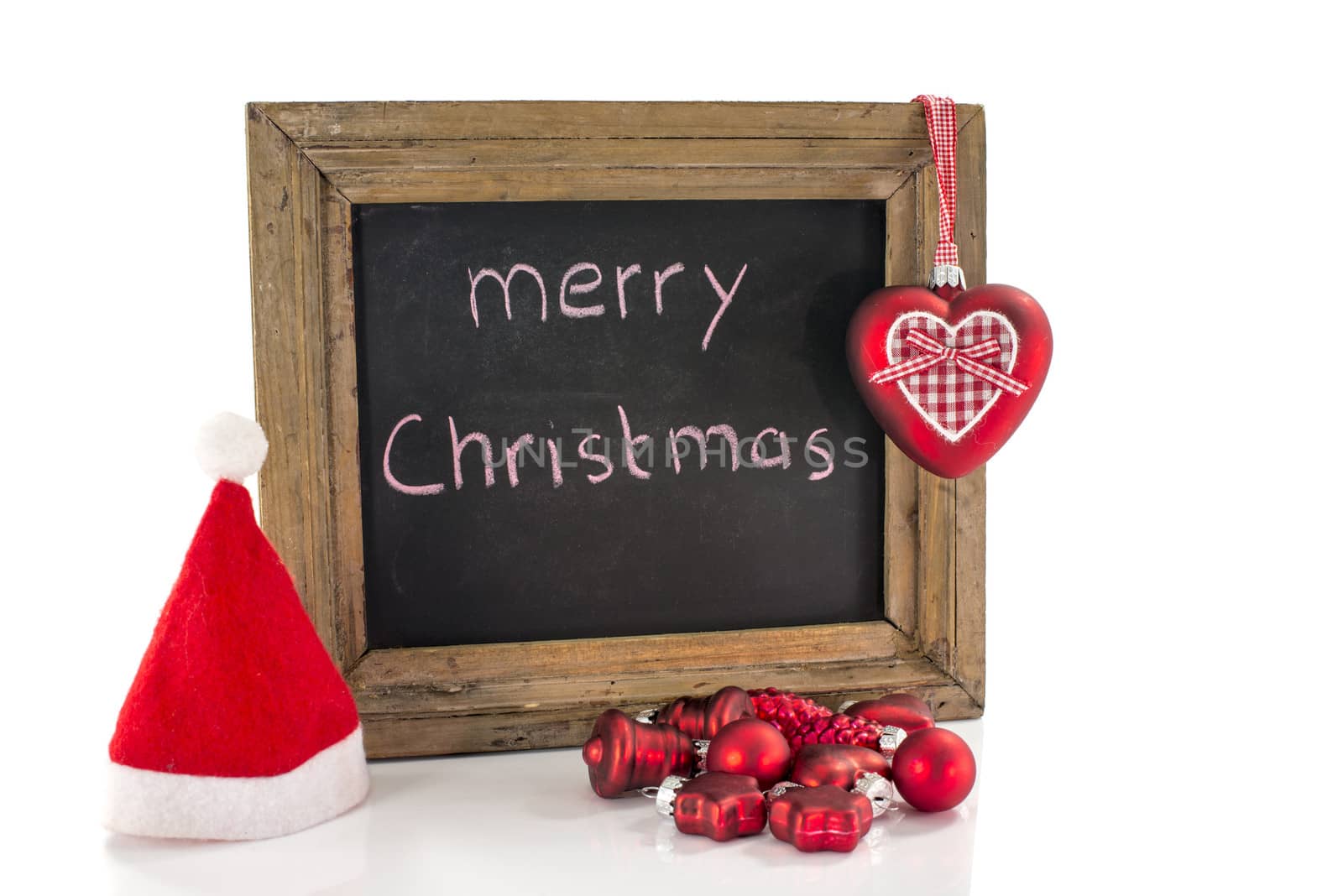 merry christmas blackboard with present and hat 