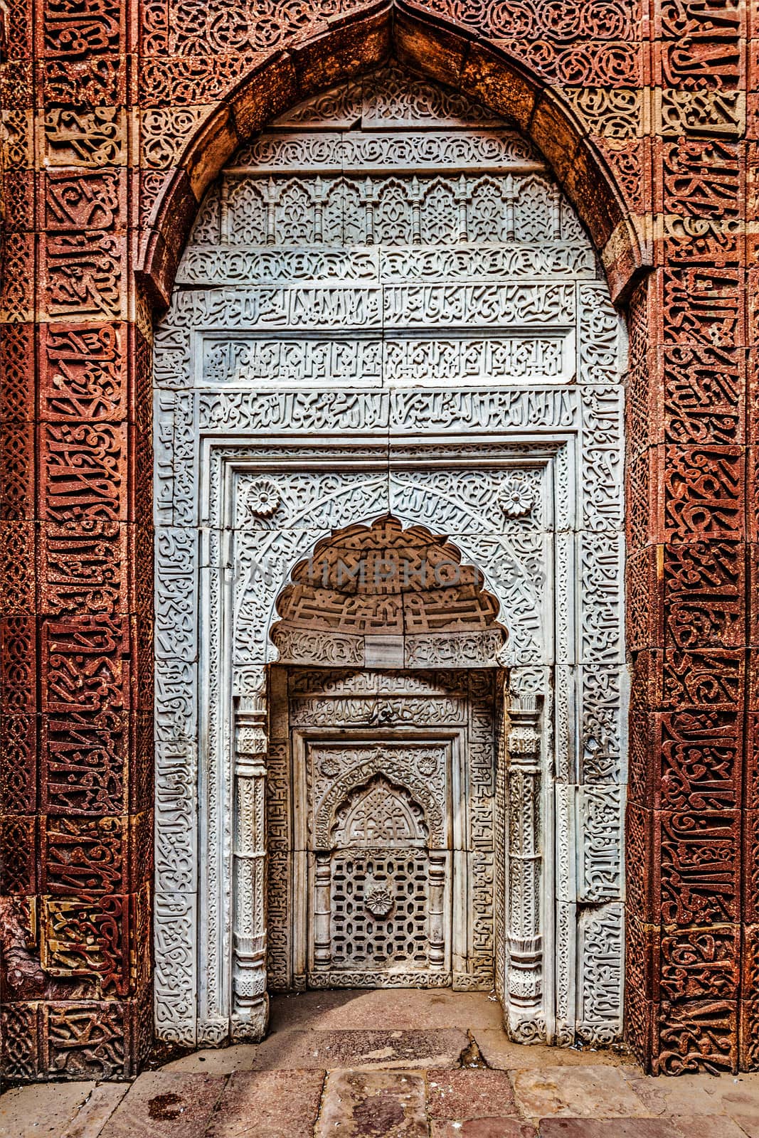 Decorated wall in Qutub complex. Delhi, India by dimol