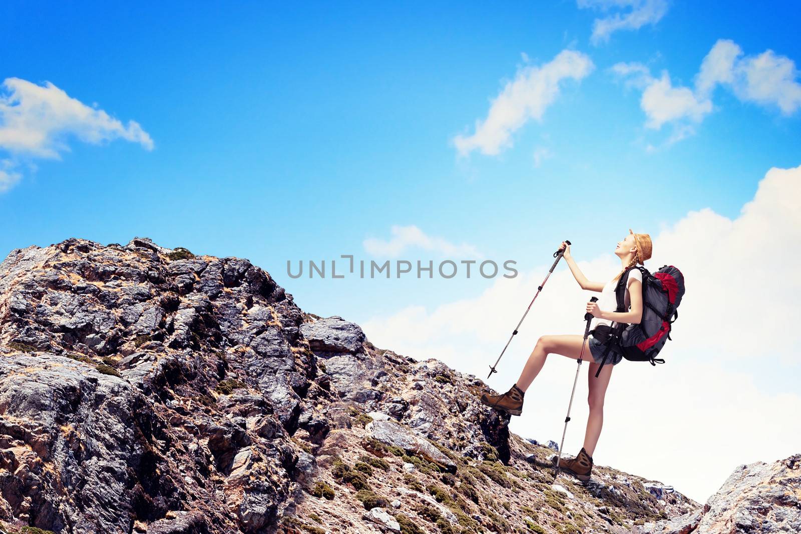 Young woman mountaineer by sergey_nivens