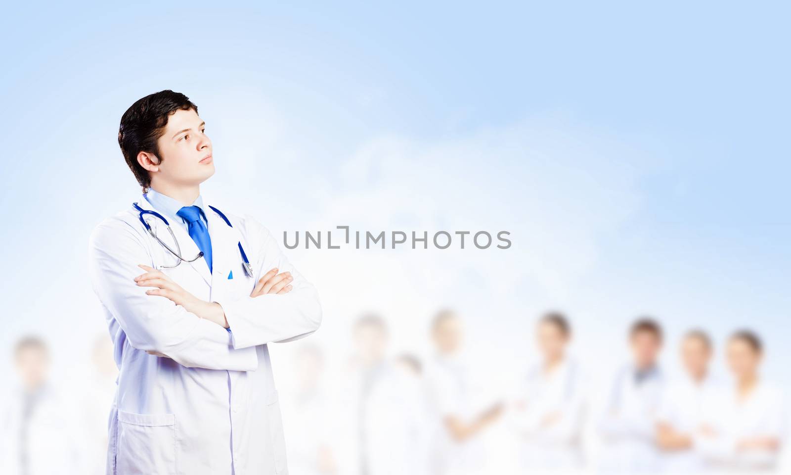 Image of male doctor with arms crossed on chest
