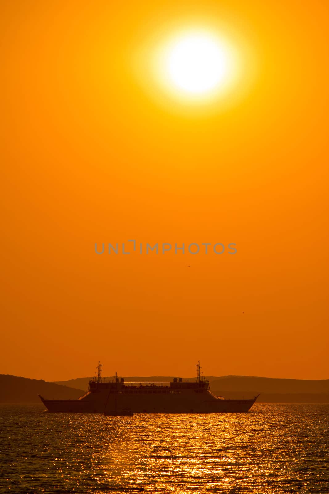 Ferry boat under sun vertical view by xbrchx