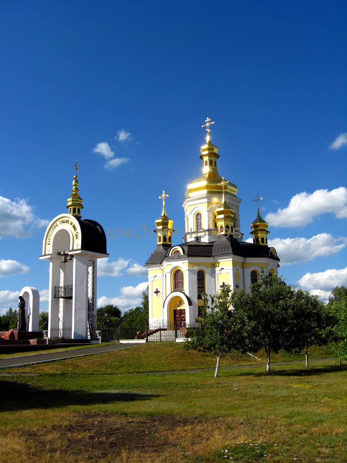 Beautiful church with golden domes by alexmak