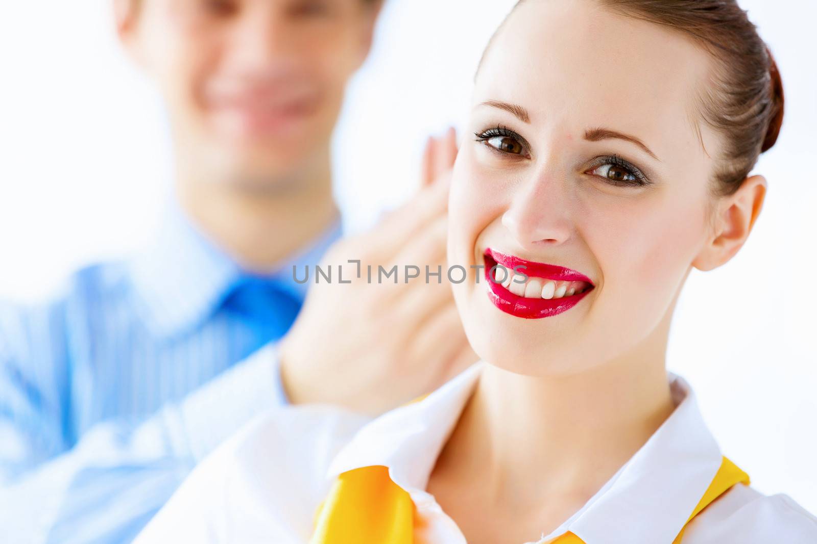 Image of businessman and businesswoman smiling joyfully