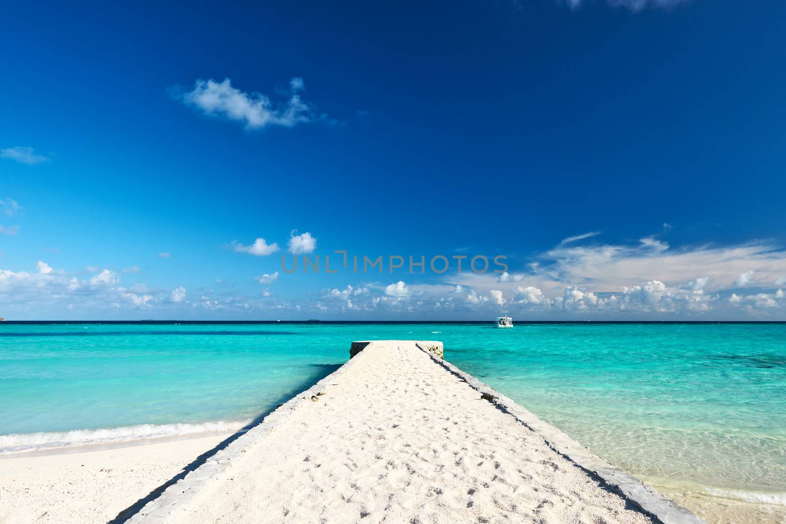 Beautiful beach with jetty at Maldives