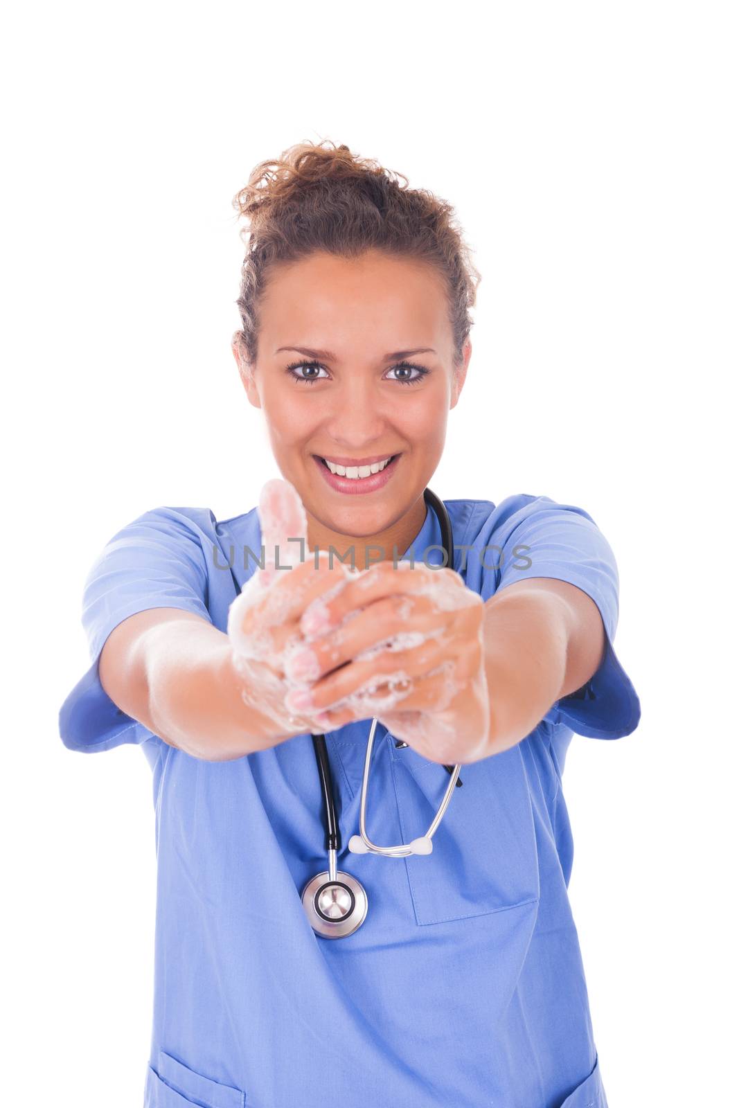 young nurse washing hands with soap isolated