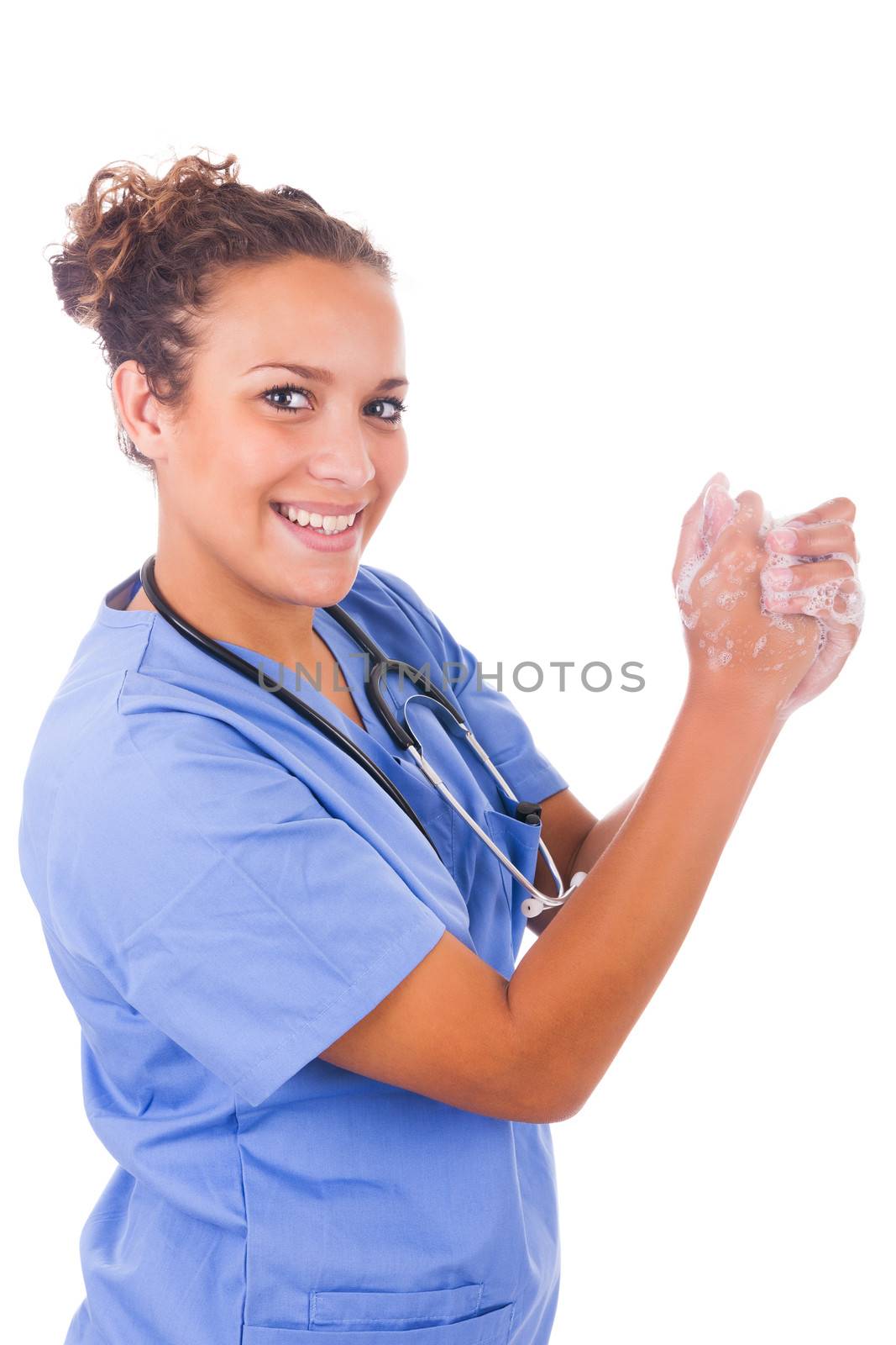 young nurse washing hands with soap isolated