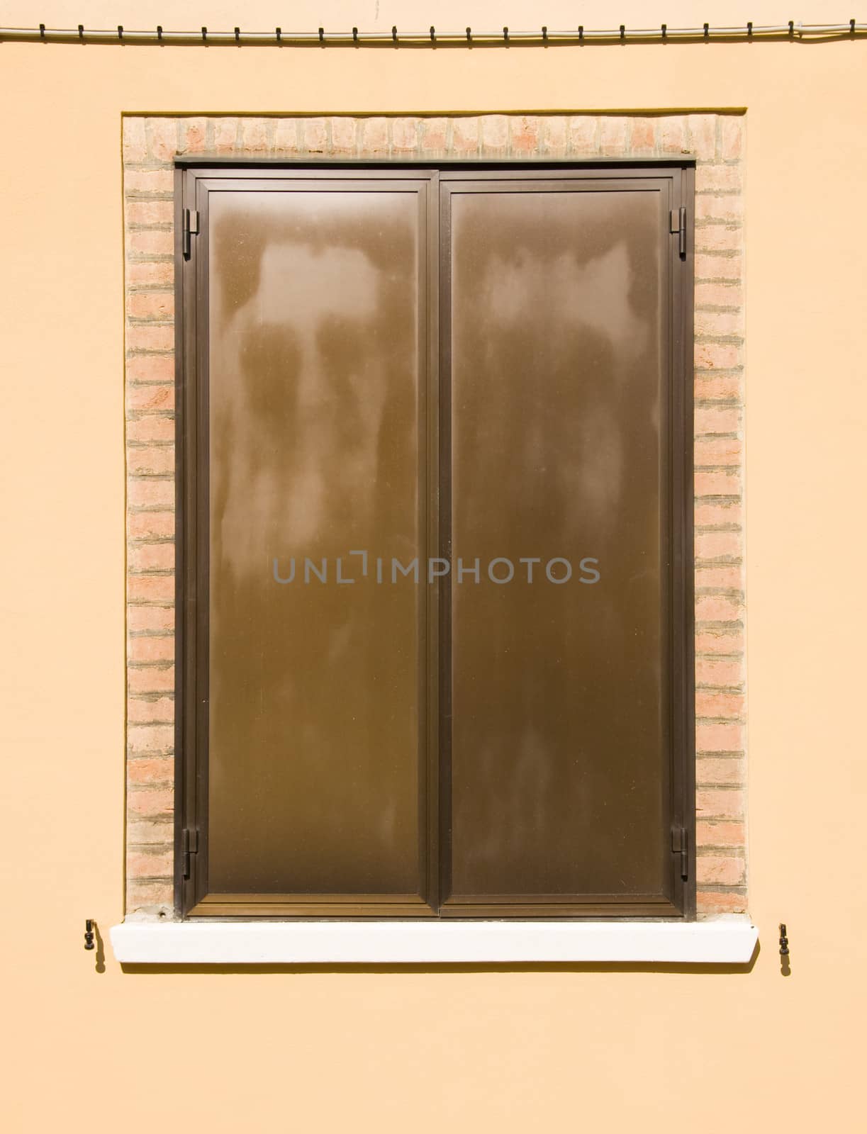 Old brown window in Venice
