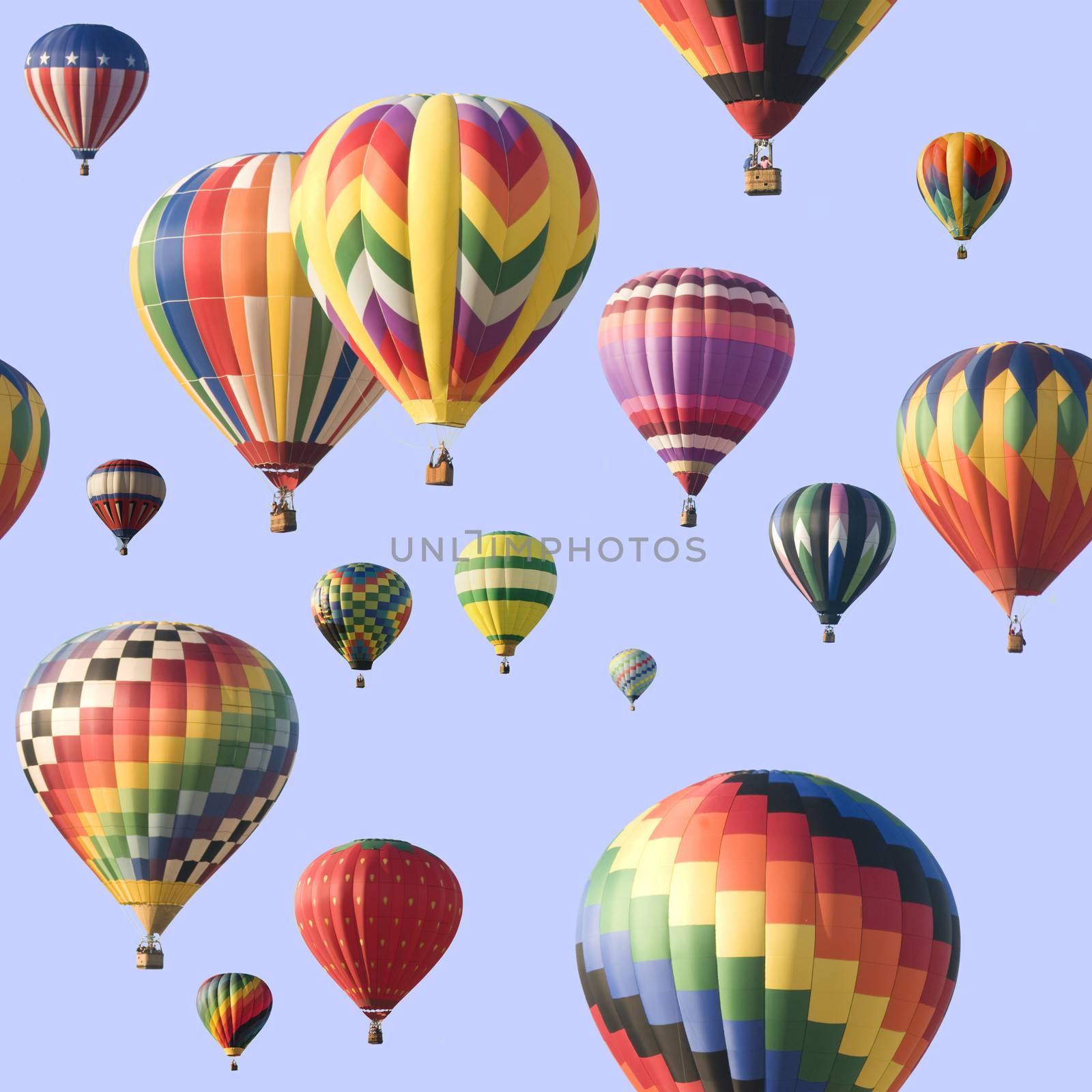 A group of colorful hot-air balloons floating across a blue sky. Image is seamlessly tileable.