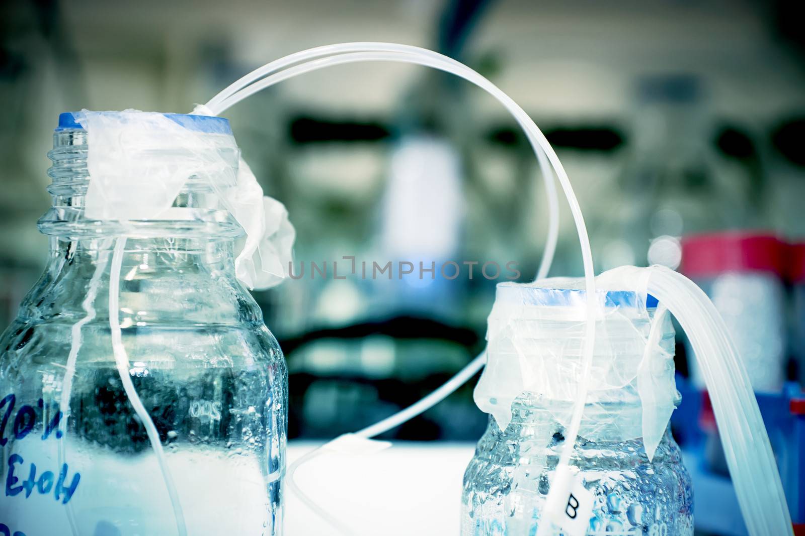 Bottles with tubes in a chemistry lab