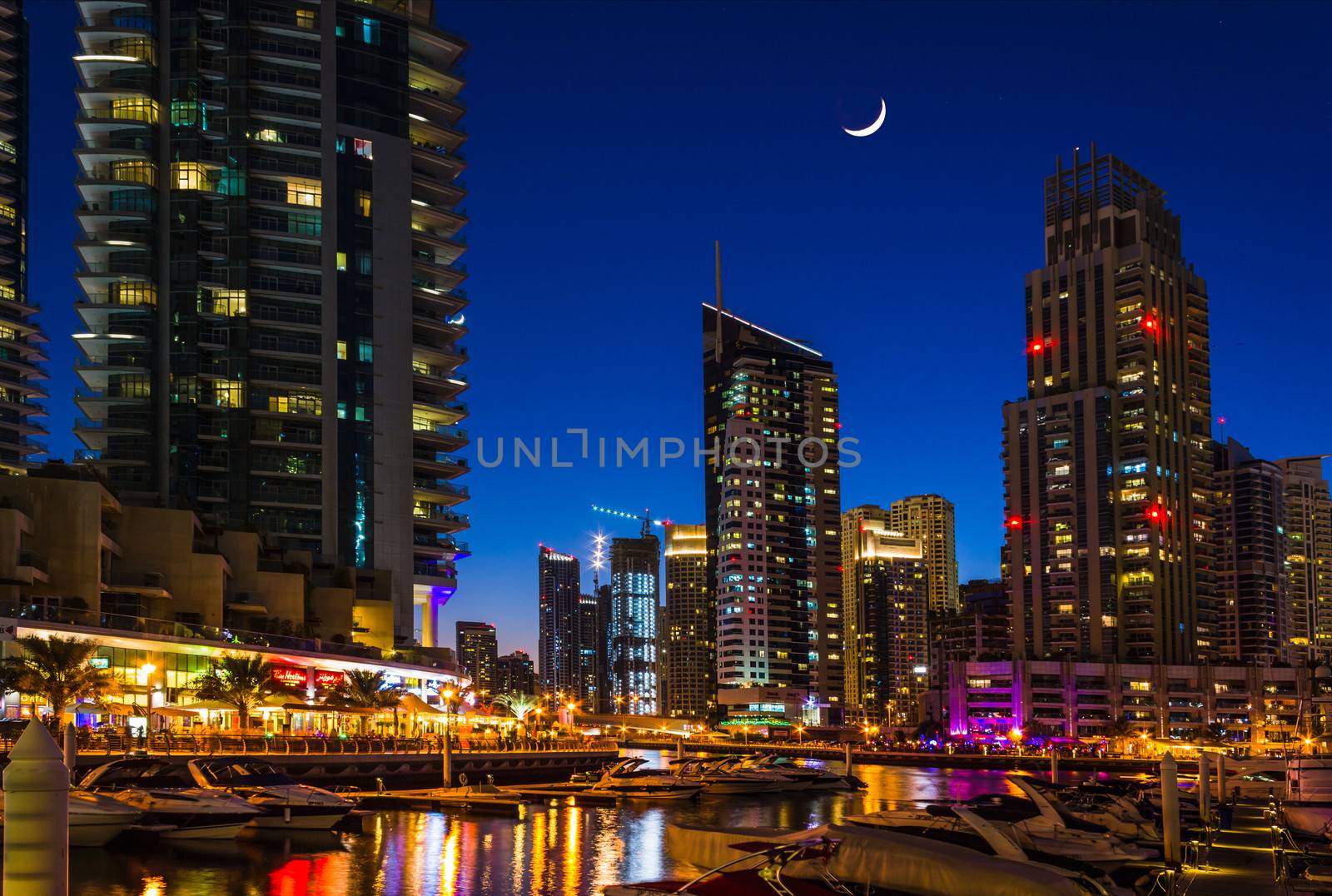 DUBAI, UAE - NOVEMBER 16: Nightlife in Dubai Marina. UAE. November 16, 2012. Dubai was the fastest developing city in the world between 2002 and 2008.